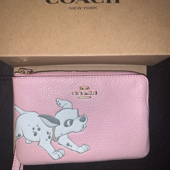 Disney Handbags - Disney coach 101 dalmatians wristlet
